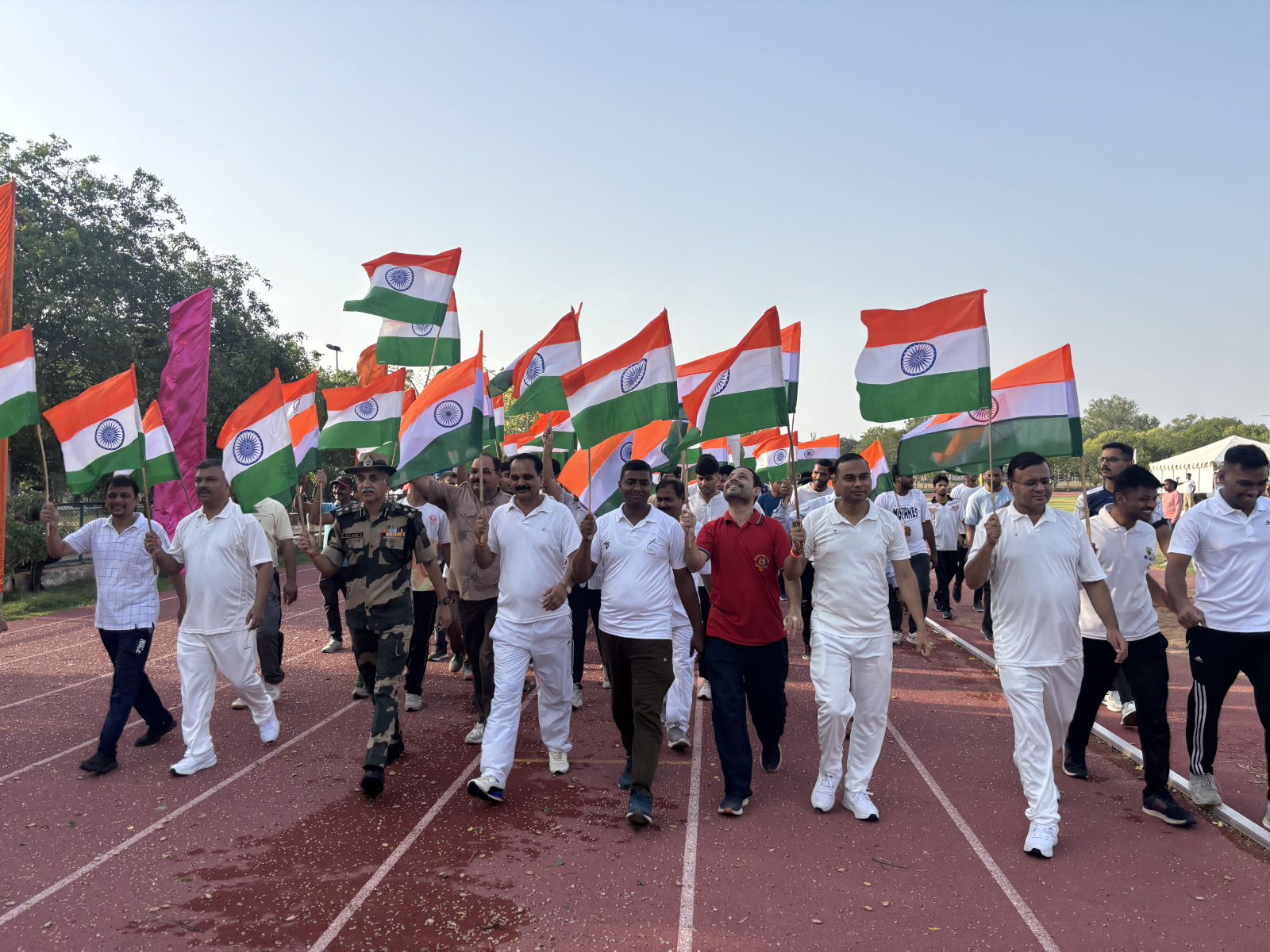 RJIT faculty, students, and BSF personnel walking with pride during the Tiranga Yatra.